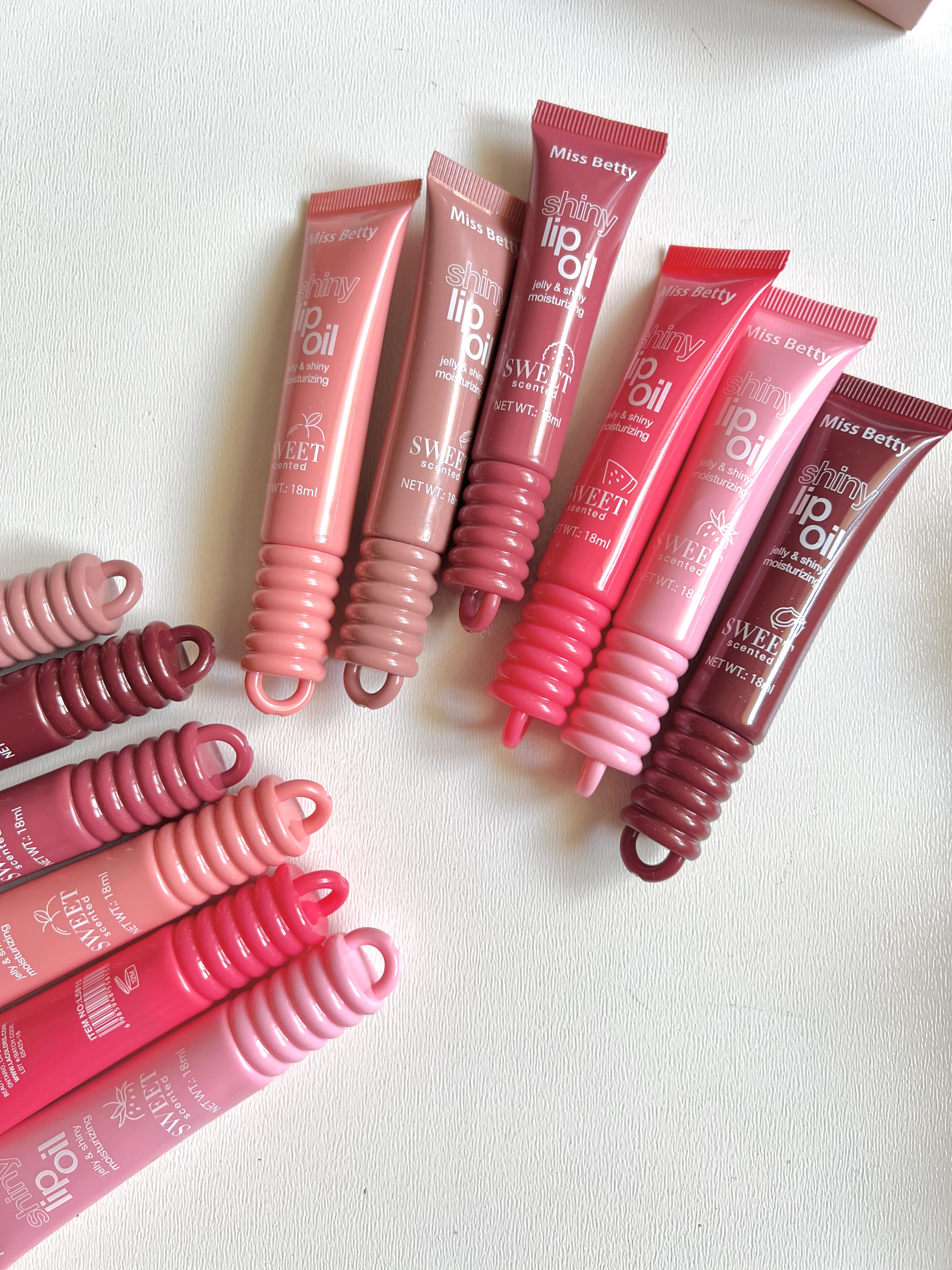 روغن لب براق میس بتی Miss Betty مدل Shiny Lip Oil حجم 18ml